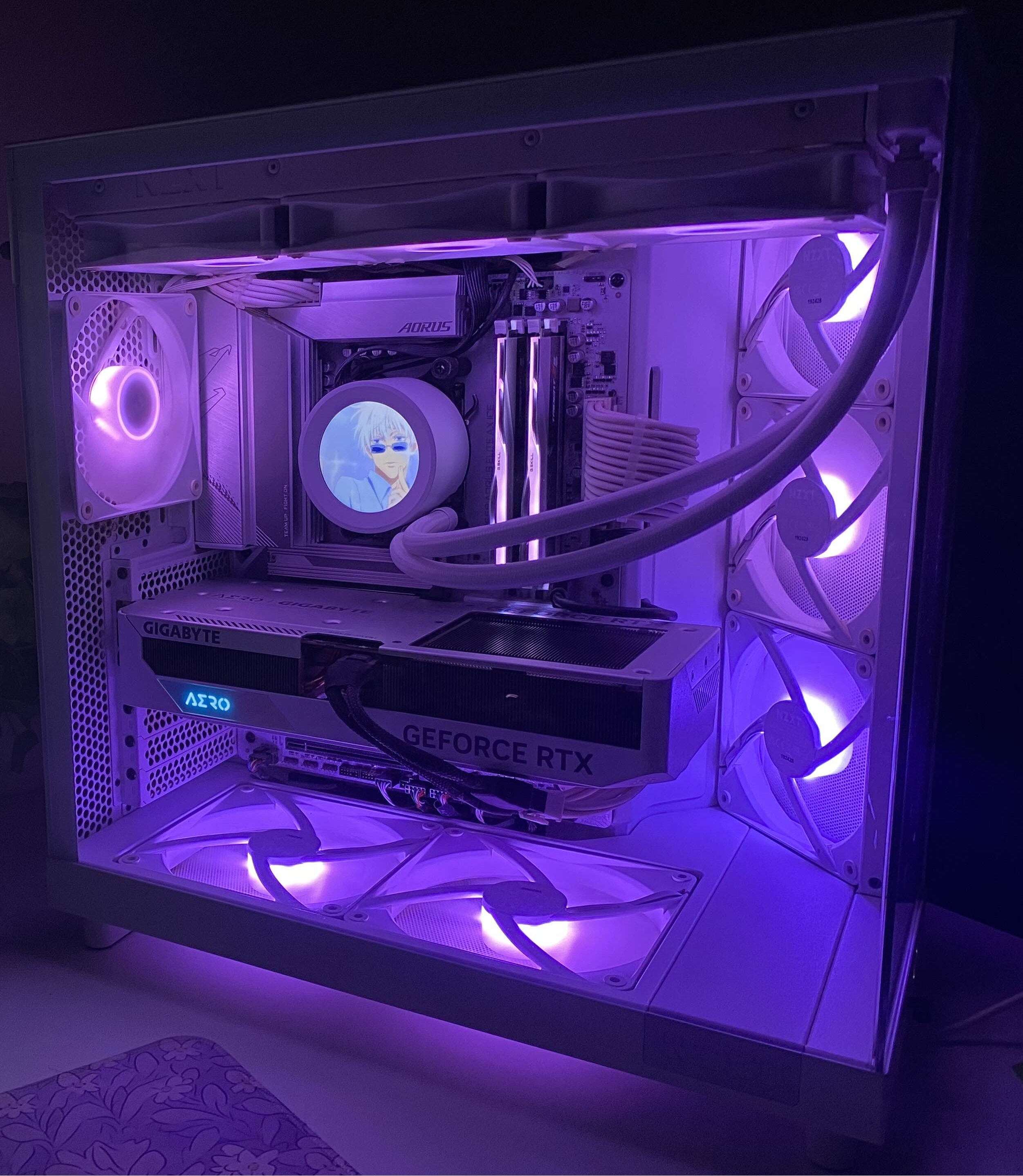 A clean white-and-purple aesthetic build featuring fully-synchronized RGB, high-airflow front fans, and a minimalist component layout. Perfect for gamers who want both style and cooling performance.