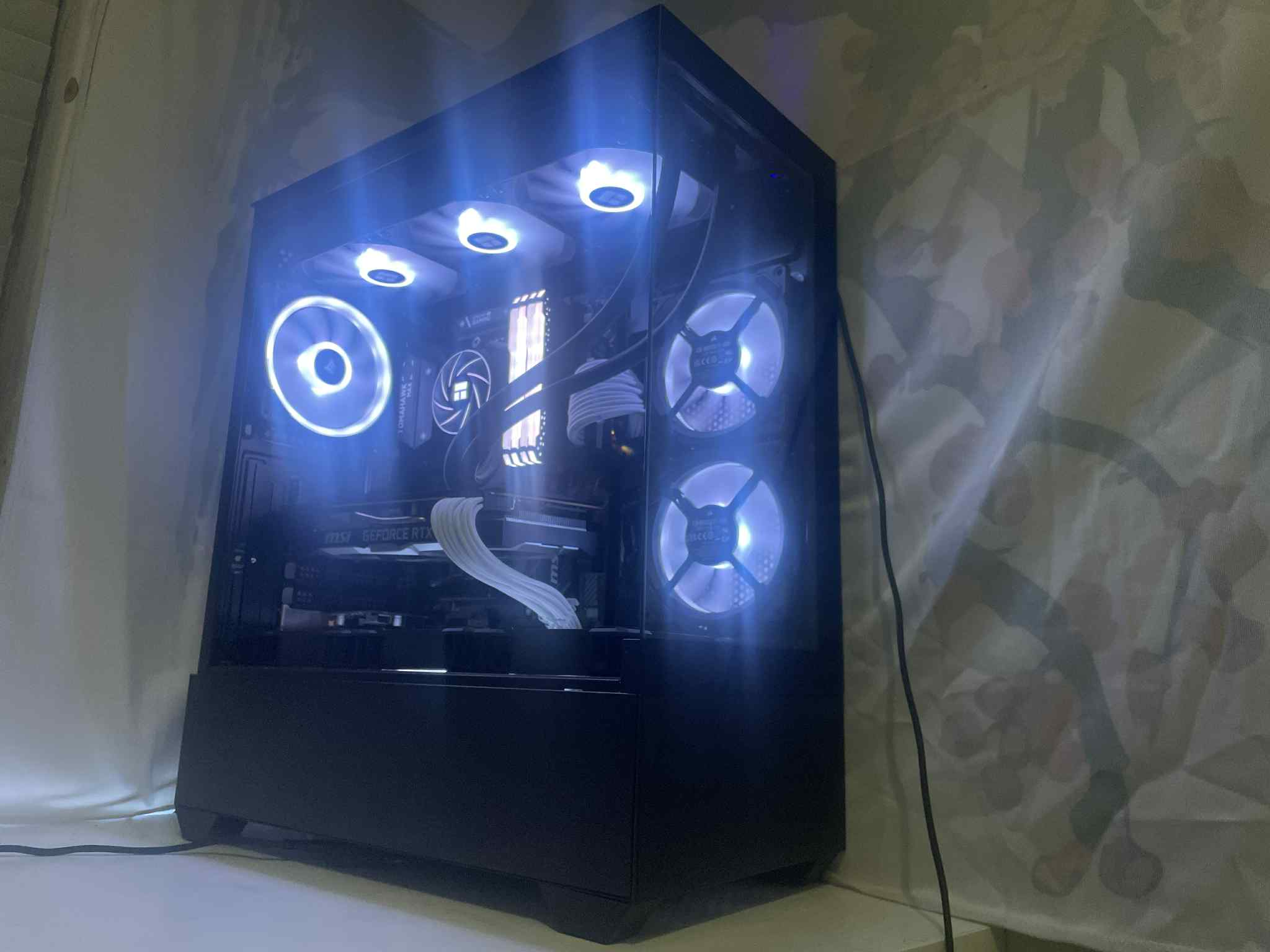 A sleek, modern blue RGB system with a frosted aesthetic and quiet fan configuration. Designed for cool, stable performance and a cohesive futuristic look.